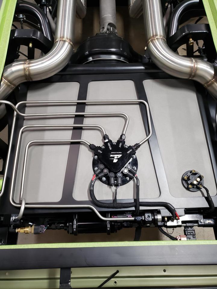 Aeromotive tank top with stainless main, return, vent and aux lines and sleeved pump wiring
