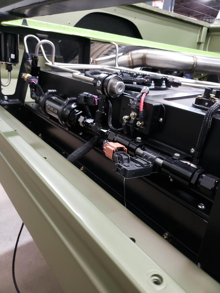Fuelab filter, Radium regulator and pump controller mounted alongside the tank