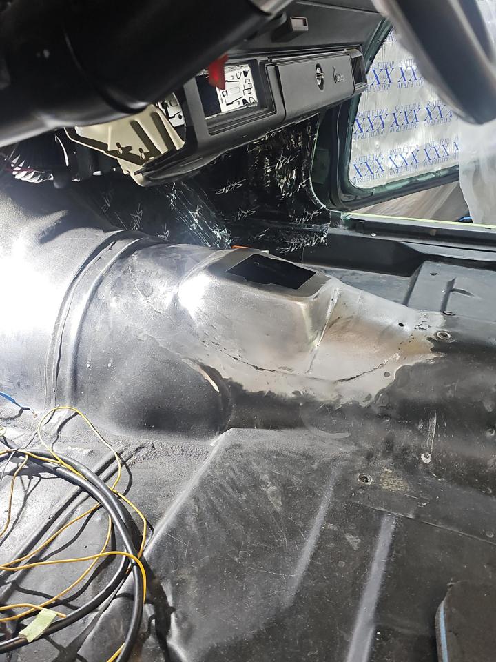 Modified transmission tunnel with a new shifter opening welded in