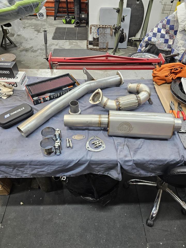 Exhaust upgrade parts with K&N filter and Tunezilla tuner ready to install